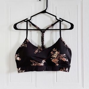 Black and rose gold floral sports bra